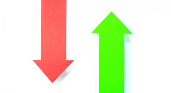 Red down arrow and green up arrow.